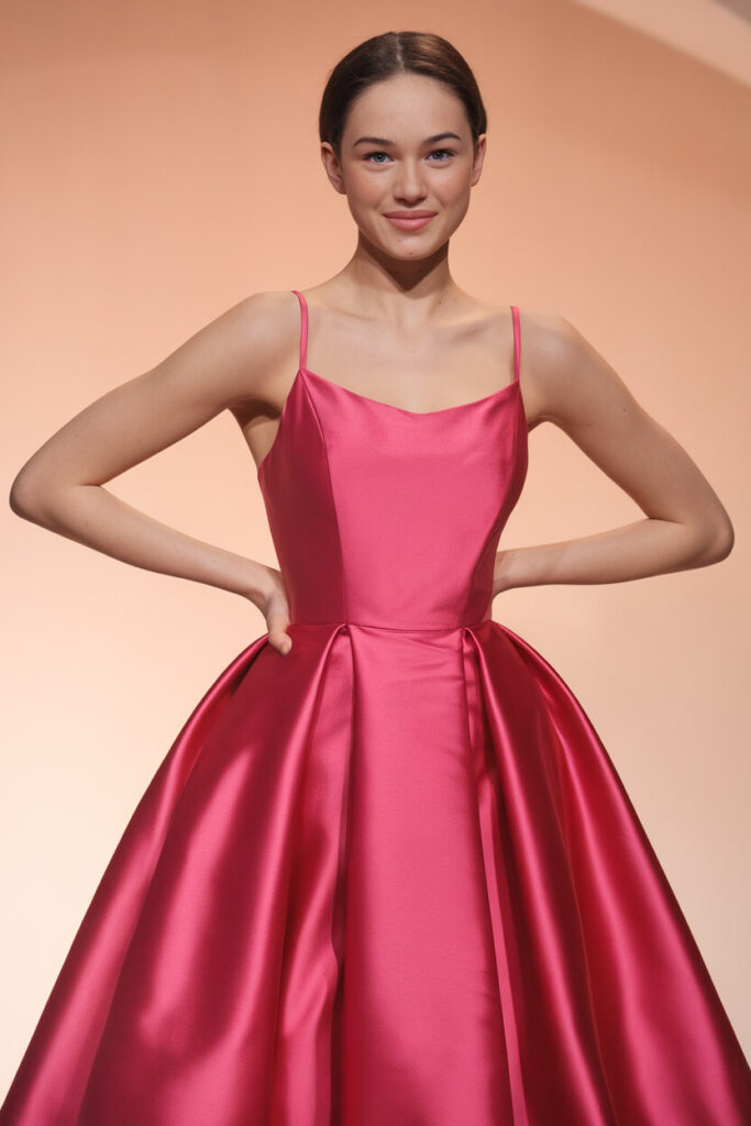 Headline: Sleek Satin Gown with Delicate Spaghetti Straps Picture Name: Pink birthday outfit (11).jpg This vibrant pink satin gown features clean lines and a minimalistic design, making it a timeless choice for formal events. The spaghetti straps add a delicate, feminine touch, while the full skirt creates an elegant silhouette. With its structured bodice and flowy fabric, this gown is perfect for those who appreciate understated sophistication. Suggested Clothing Links: Spaghetti Strap Satin Gown Full Skirt Evening Dress Minimalist Satin Formal Dress