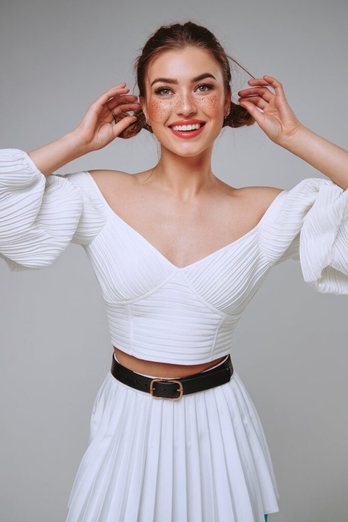 Playful Off-Shoulder Crop Top with Pleated Skirt